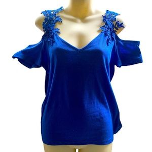 Woman’s cold shoulder top